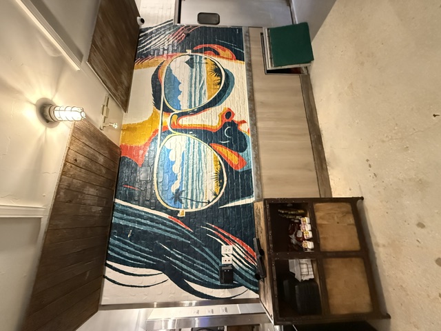 SaintPaintArts mural artwork for Tarpon Springs businesses